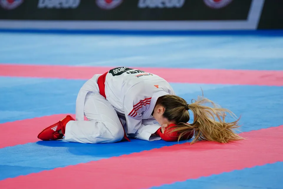 An athlete on the tatami after the deciding bout