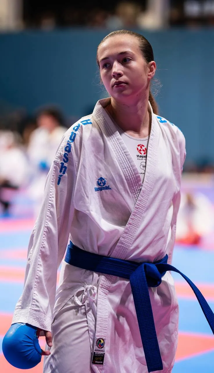 Kumite: an athlete steps onto the tatami