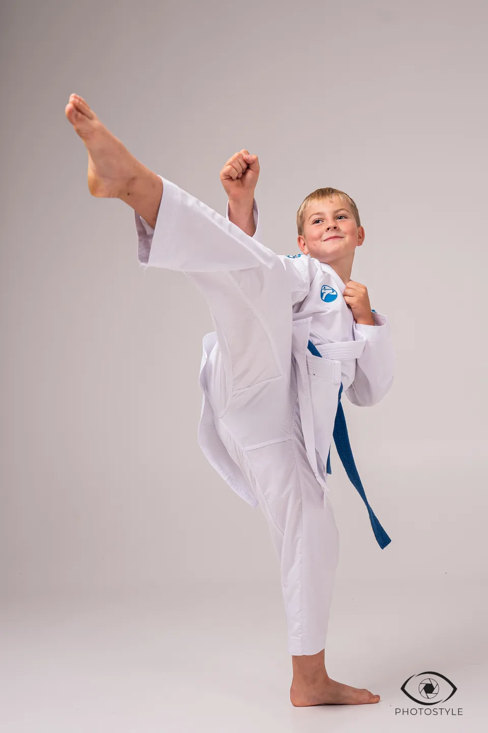 Studio session: a young karateka throws a kick